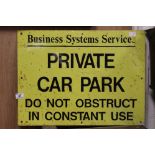 A metal Private Car park Do Not Obstruct sign. 46 cm x 61 cm .