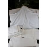 A collection of vintage linen table cloths.