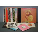 Vinyl - Collection of 11 Reggae LP's plus some 7" singles to include Bob Marley, Peter Tosh, The