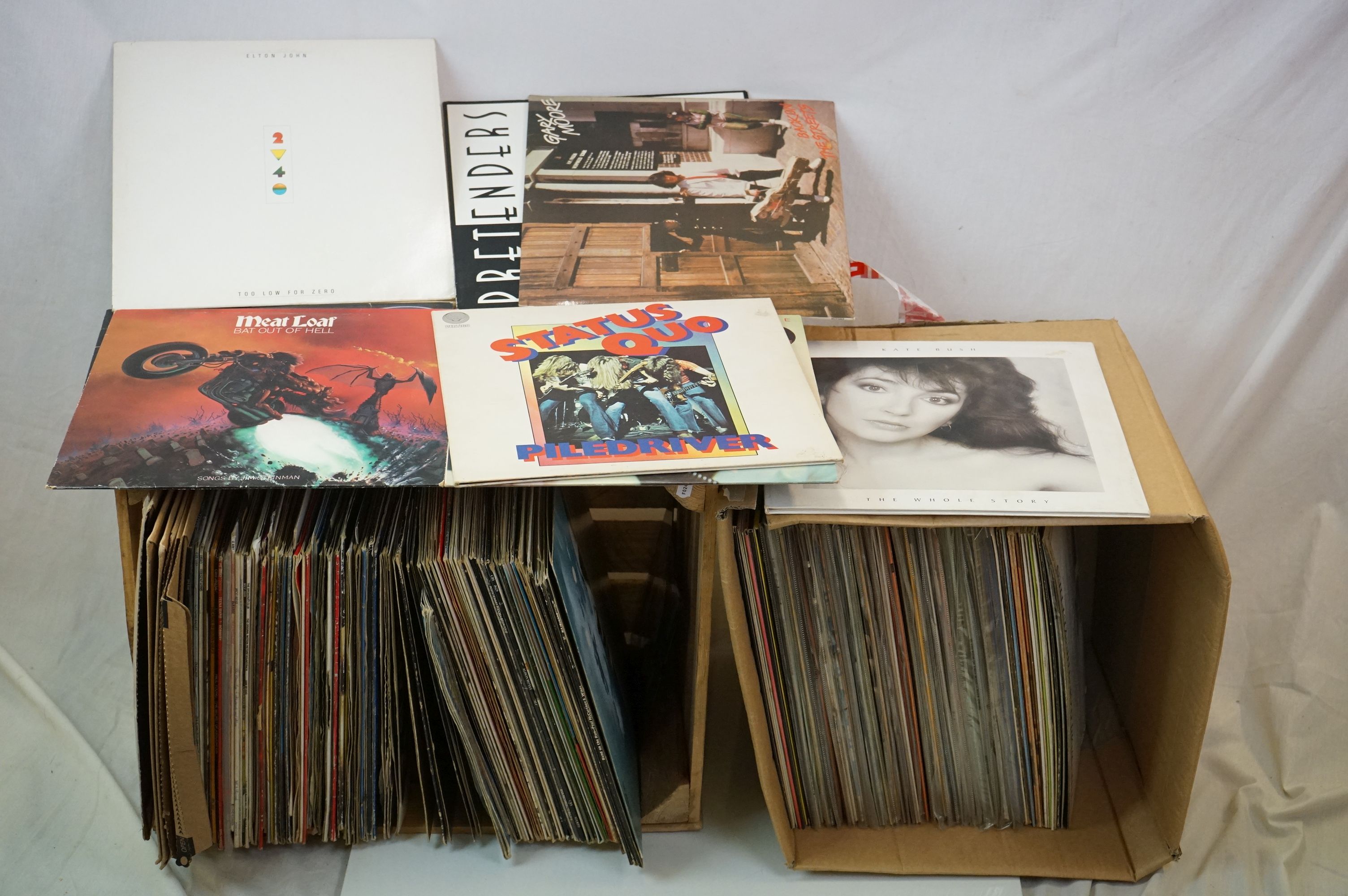 Vinyl - Approx 100 vinyl LP's and 12" Singles mainly rock, country and pop to include Johnny Cash,