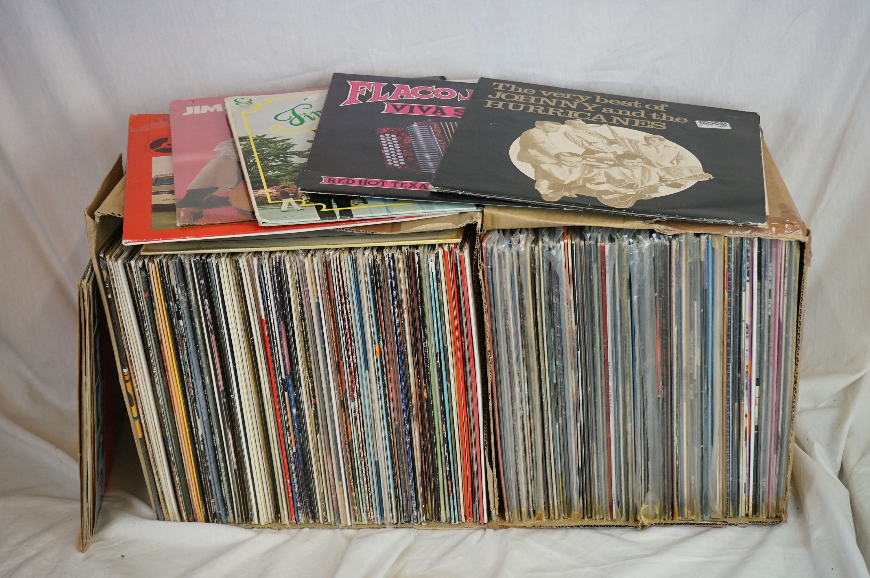 Vinyl - Around 200 LPs spanning the genres to include Country, MOR etc, sleeves and vinyl vg+ (two