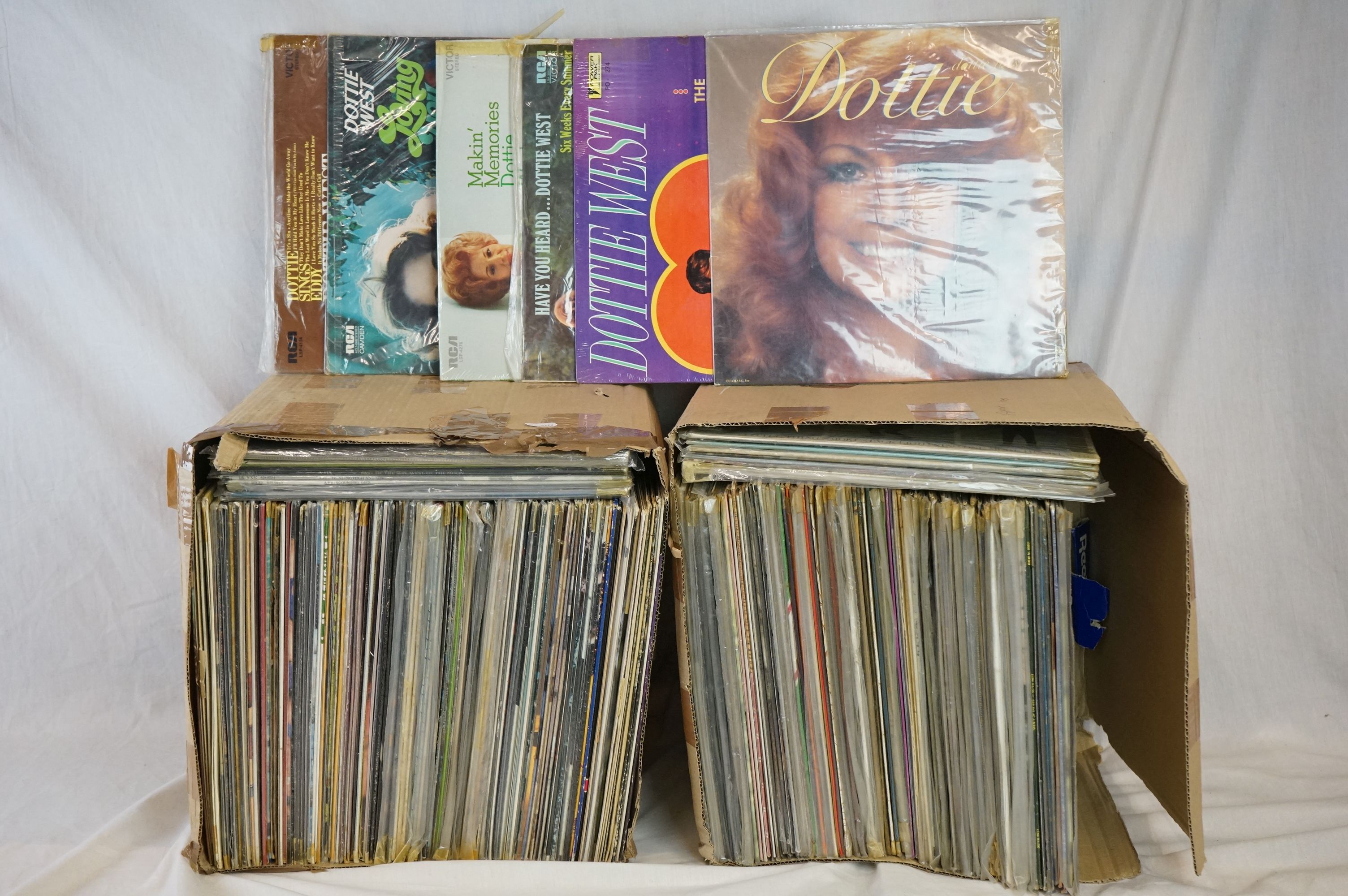 Vinyl - Over 200 LPs featuring various artists and genres to include Country, MOR etc, sleeves and