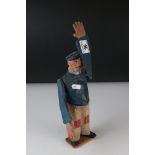 A novelty carved wooden figure of a bearded fisherman with articulated arms.
