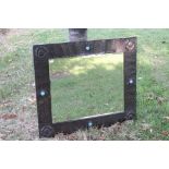 In the manner of Liberty's of London, Arts and Crafts Rectangular Wall Mirror, the hammered Pewter