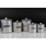 A set of aluminium graduated kitchen storage jars to include Flour, Sugar, Rice, Tea & Coffee.