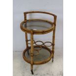 Mid 20th century Italian Bamboo and Glass Circular Drinks Trolley, 56cms diameter x 85cms high