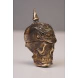 Brass vesta case in the form of a skull wearing a helmet