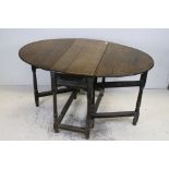 Antique Oval Gate-leg Table raised on turned and block supports, 88cms long x 69cms high