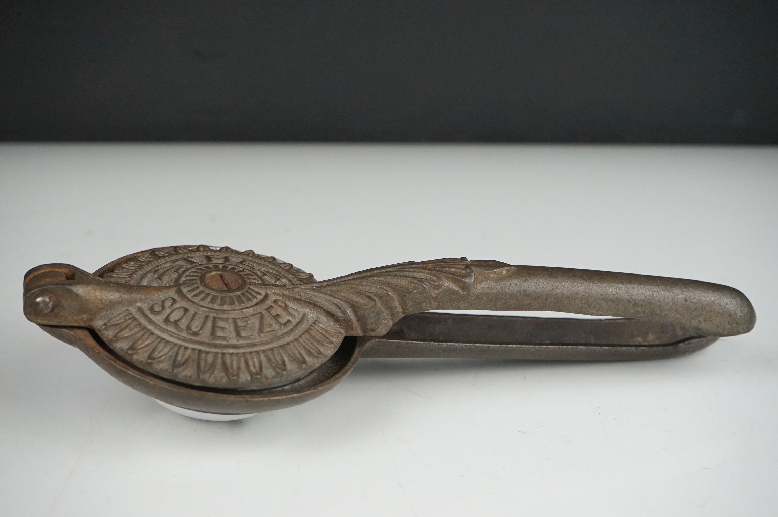 An early 20th century cast iron Lemon Squeezer with insert. - Image 2 of 6