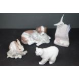 Collection of Four Items of Lladro including Rabbit, Polar Bear, Cat and Dog plus a Lladro Society