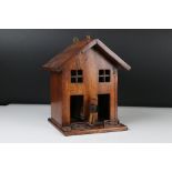 20th century Wooden Novelty House with spinning Man and Wife ' now you see now you don't '