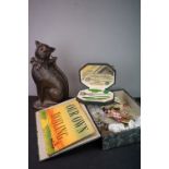 A box of mixed collectables to include a manicure set, vintage pin badges and coins together with