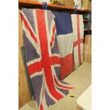 Three large flags to include a Union Jack, a St. Georges Cross & a French tricolour