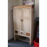 19th century Pine Corner Cupboard, the two doors opening to shaped shelves over a drawer, 100cms