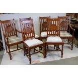 Set of Six Teak / Hardwood Dining Chairs, the splats set with roundels (including two carvers),
