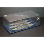 A cased diorama of three naval battleships to include Prince Eugen, Admiral Hipper and Admiral