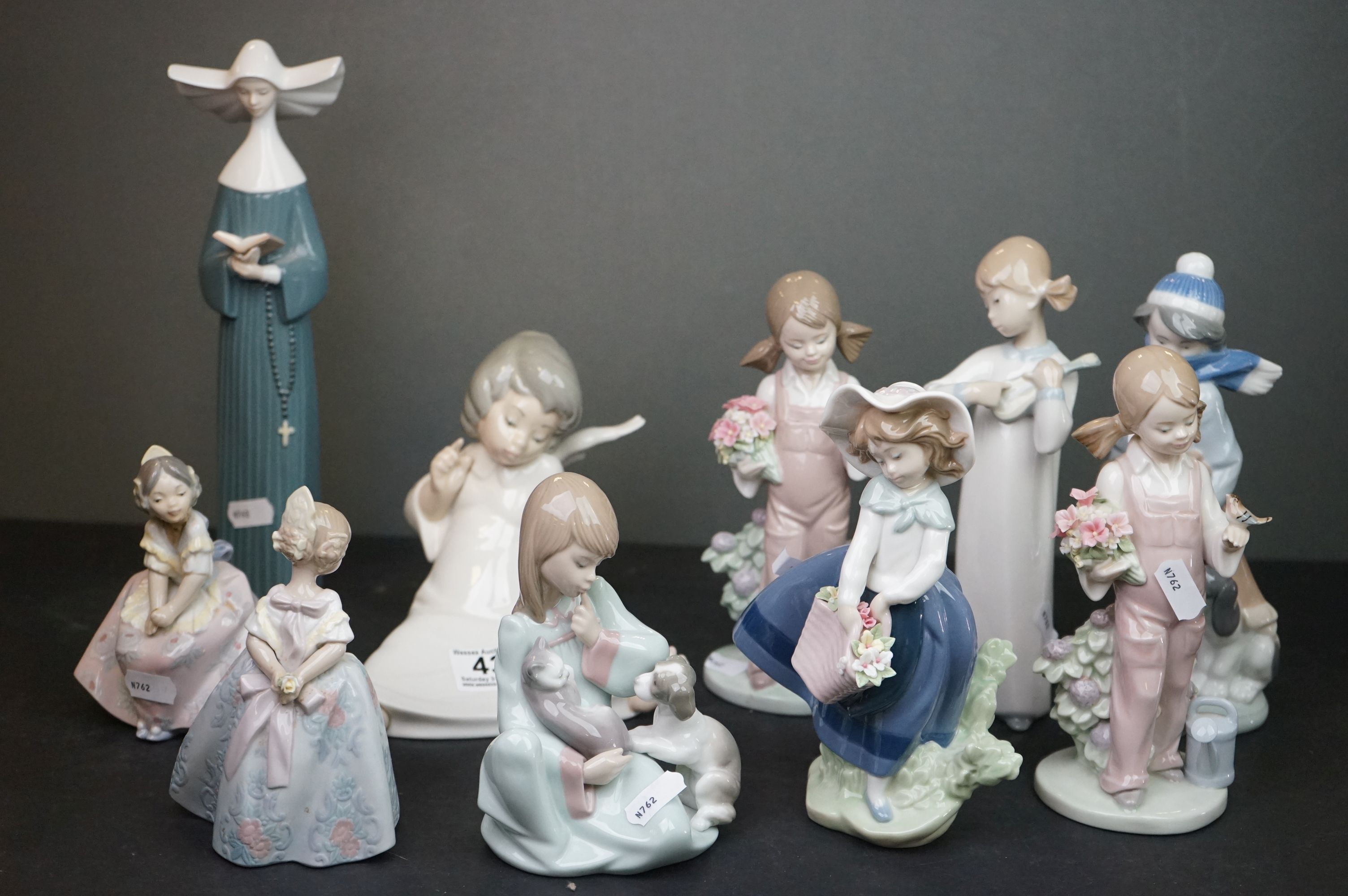 Collection of Ten Lladro Ceramic Figures including Nun, 26cms high
