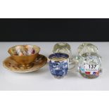 A collection of three Millefiori paperweights together with a 18th / 19th century blue & white cup