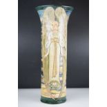 A large Art Nouveau Della Robbia Pottery Cylindrical vase decorated with Angels by Cassandia Anni