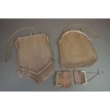 Two vintage white metal mesh handbags together with two similar purses.