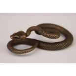 Metal figure of a viper snake