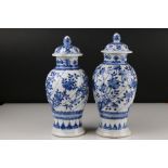 Two Chinese blue and white lidded vases with floral decoration, both signed with six Character marks