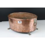 Large Copper Oval Planter with Brass Lion Mask Ring Handles and Lion Paw Feet, 33cms long