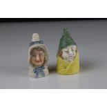 Two Royal Worcester Candle Snuffers including woman in bonnet with puce mark and Mr Caudle 1976.