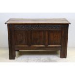 18th century or Later Oak Coffer, the three panel front with floral carved frieze, 115cms long x