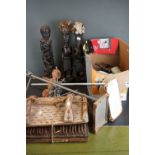 A group of mixed collectables contained within two boxes to include carved tribal figures and