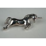 Sterling silver brooch, in the form of a cast figure of a unicorn