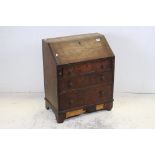 19th century George III style Oak Bureau, of small proportions or child's, the fall front writing