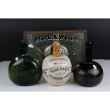A group of three antique bottles to include a Dewar's Perth Whisky onion shaped bottle and a Glen