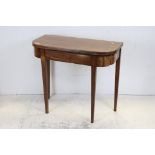 Early 19th century Mahogany Fold over Tea Table raised on square tapering legs, 83cms wide x 72cms
