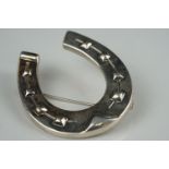 Large sterling silver horseshoe shaped brooch