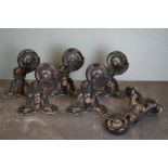 A set of six Victorian industrial cast iron trolley casters, registration mark and maker marked