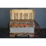 A vintage German Piosa accordion.