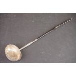 A Georgian fully hallmarked sterling silver toddy ladle, hallmarked rubbed and indistinct.