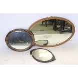 Three Oval Mirrors, the largest 94cms long