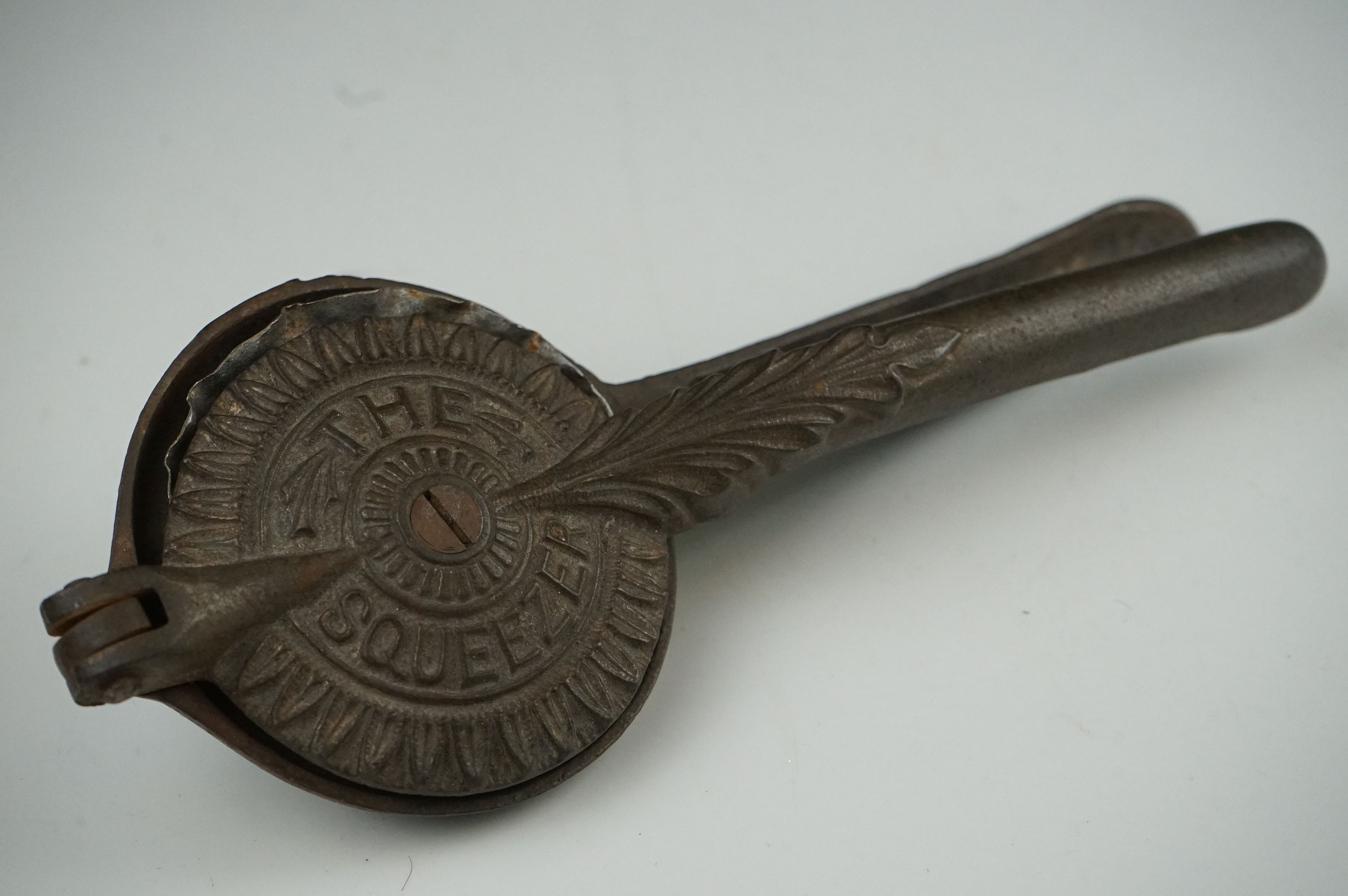 An early 20th century cast iron Lemon Squeezer with insert. - Image 6 of 6