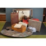 A box of mixed collectables to include oil cans, photograph album, a cased microscope and an artists