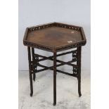 Chinese / Asian Hardwood Folding Table, the hexagonal folding top with pierced gallery rail held