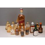 A small collection of miniatures to include Bell's Whisky and Lambs Rum together with a bottle of