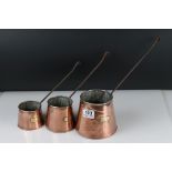 Set of Three Antique Copper Graduating Cider Measures with iron handles