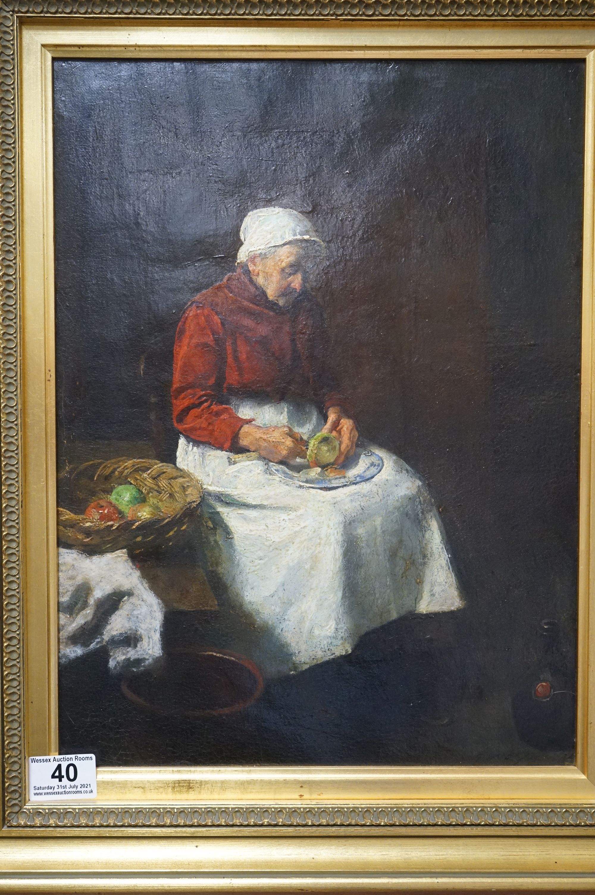 A 19th century oil on canvas of a seated old woman in an interior setting with basket of fruit,