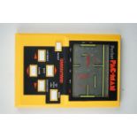A 1980's Grandstand pocket Pac-Man electronic game.