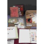 A collection of loose and mounted stamps to include GB & World examples.