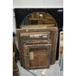 Large vintage, ebonized, framed oval bevel glass mirror, together with antique picture backboards