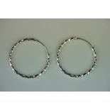 Pair of silver hoop earrings