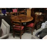 19th century style Oak Oval Tilt Top Dining Table on pedestal support, 114cms long x 74cms high